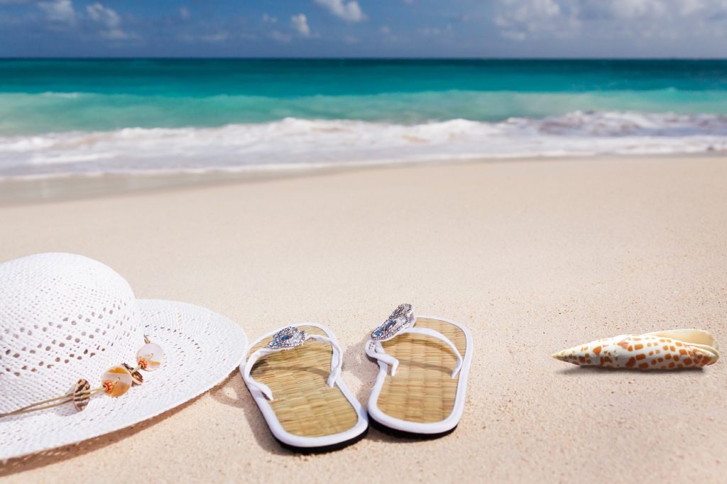 BVI Caribbean Yacht Charters slippers on the beach.