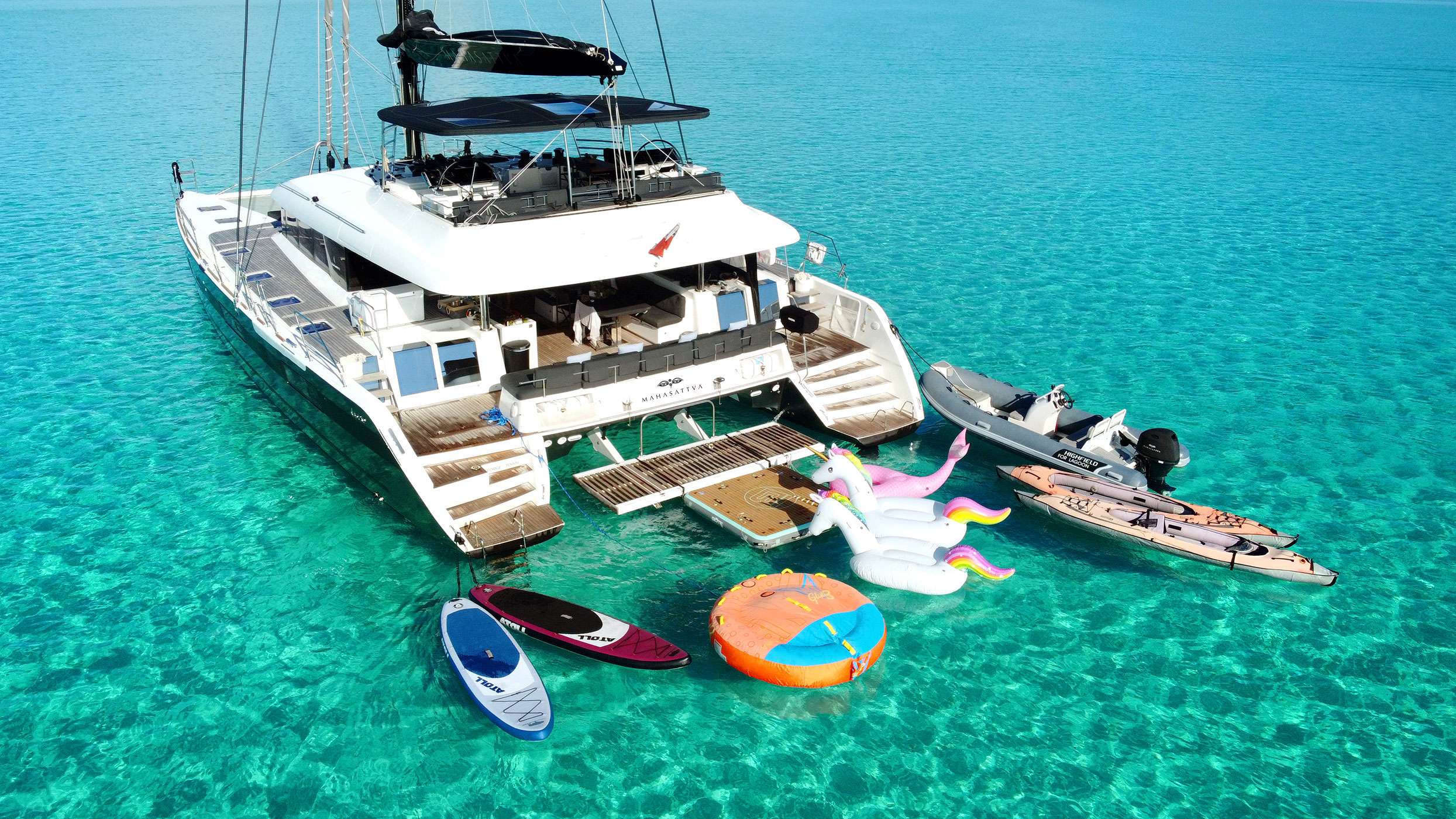 Mahsattva and her water toys. Catamaran yacht charter