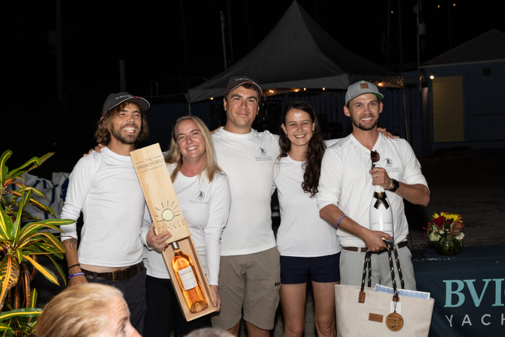 The crew of Seaclusion accepting their 2022 BVI Yacht Show award.
