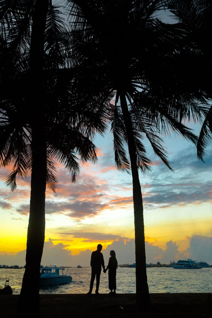Couple on a romantic sunset beach stroll - St Barts Honeymoon