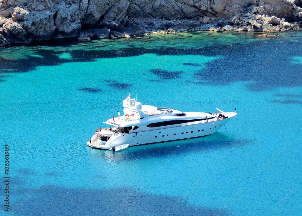 a luxury yacht anchored in the BVI - BVI crewed yacht charter