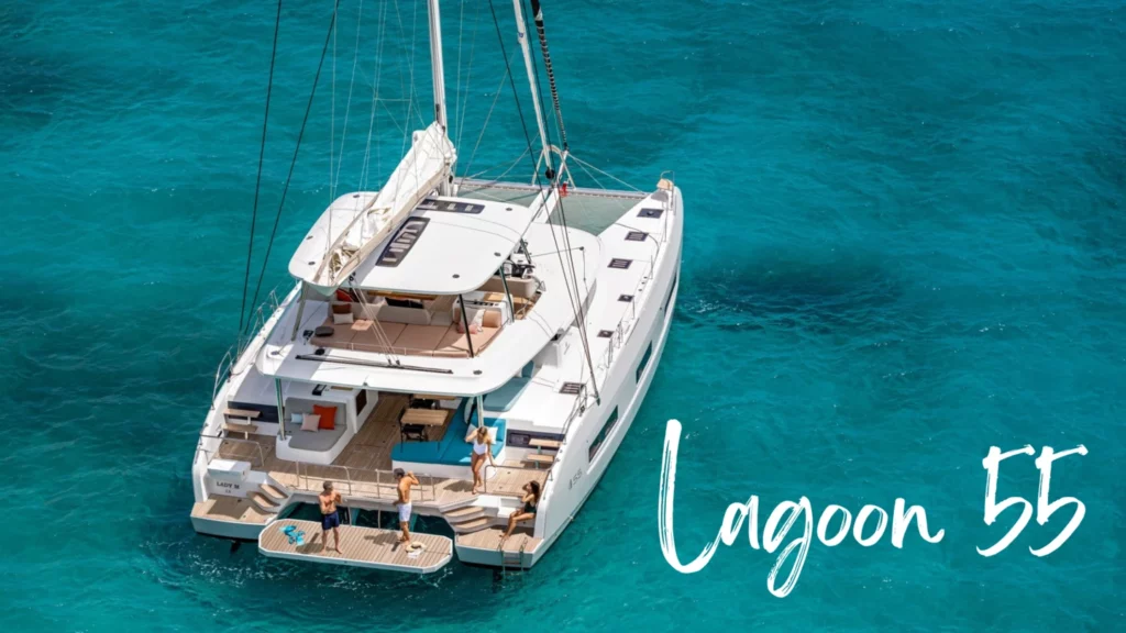 Lagoon 55 sailing catamaran's lounge area seamlessly connected to the water terrace - Lagoon 55 vs 51