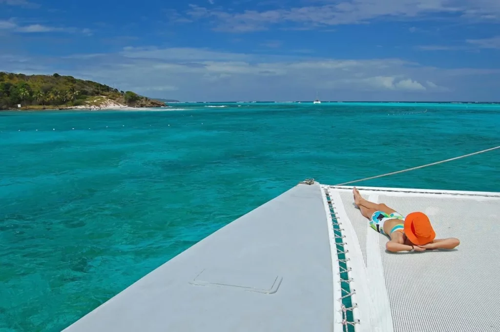 a guest relaxing on the deck - charter BVI with crew